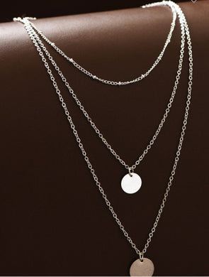 Delicate disc pendant triple layered necklace